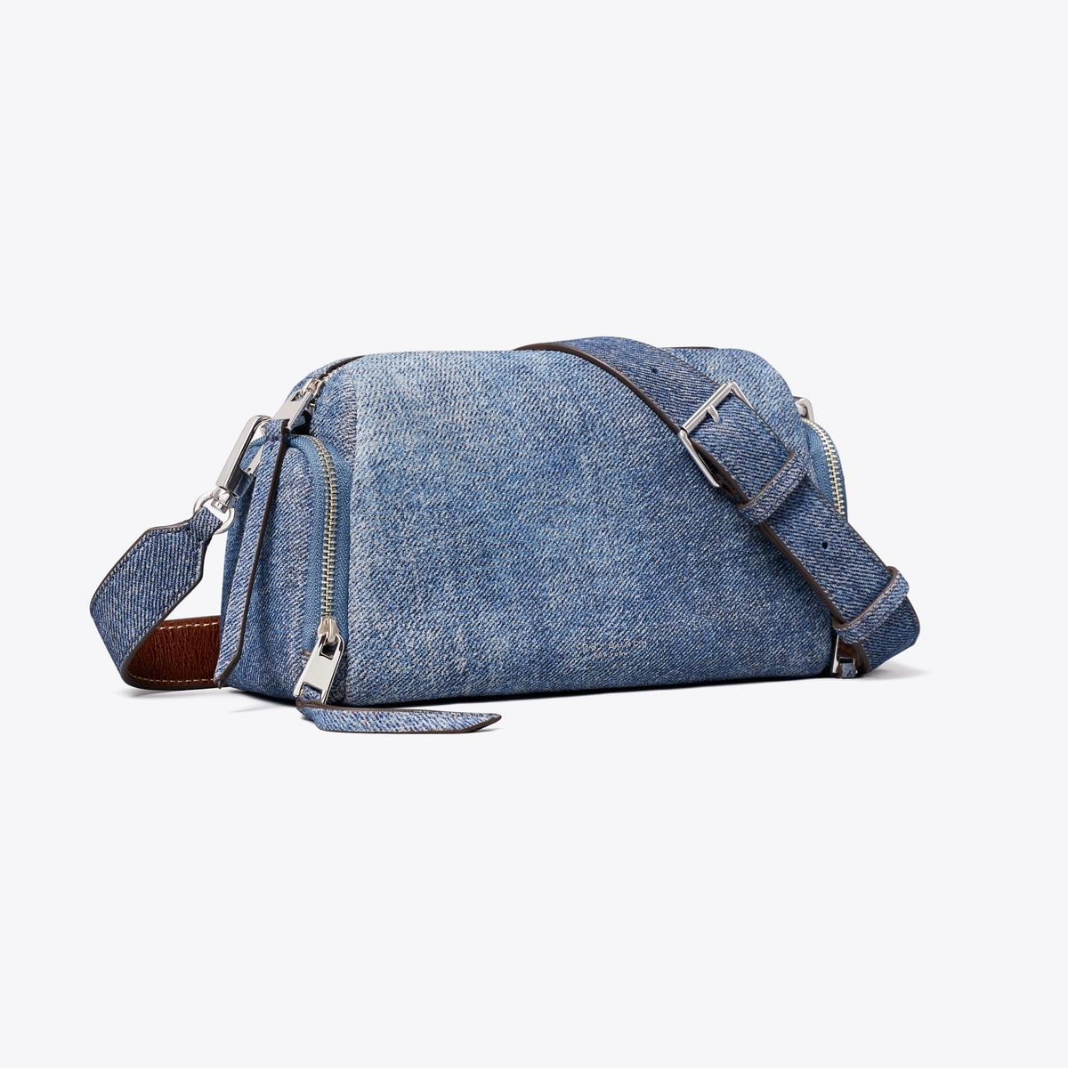 perry-denim-print-suede-voyager-crossbody-bag-angle.TB_182869_400_SLANG.pdp-1200x1200-1